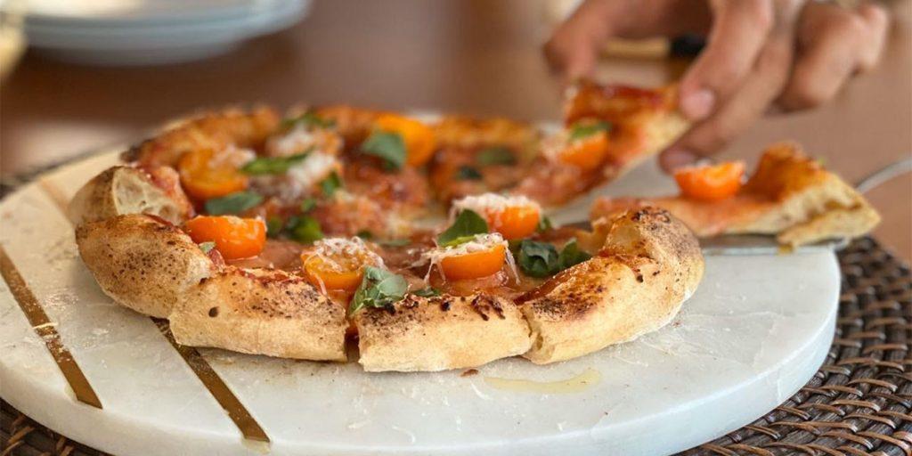 Gourmet pizza served on charter yacht ORION